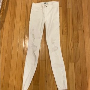 fairly good condition white ripped skinny jeans